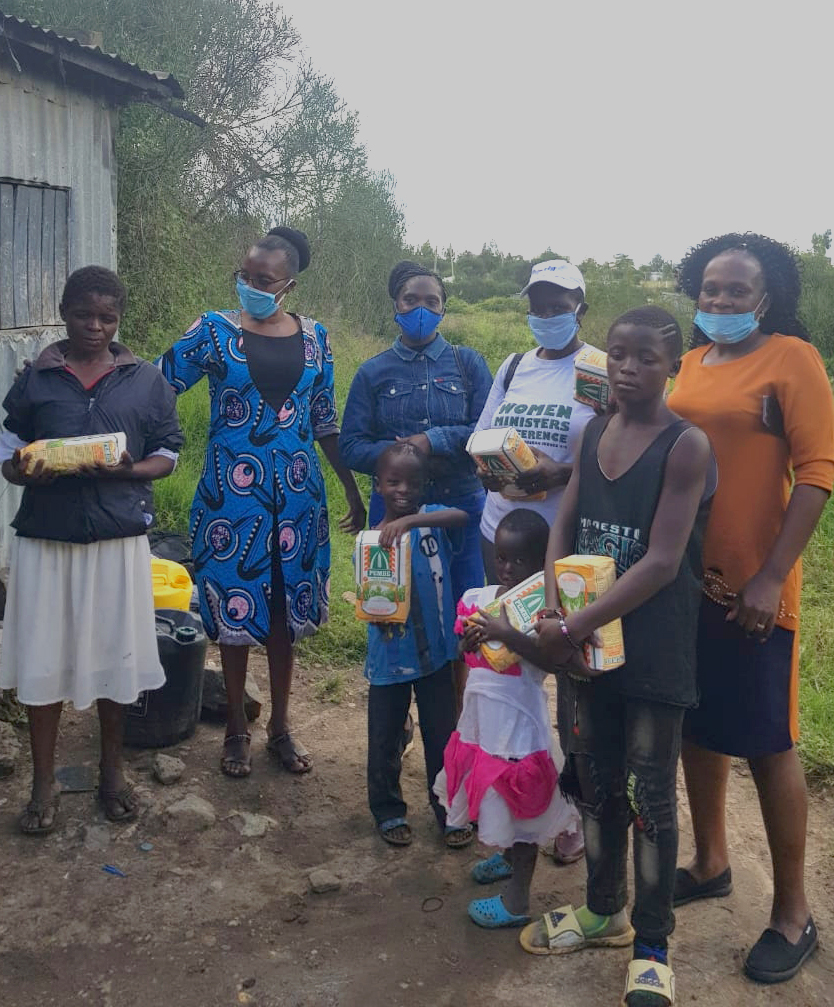 Dignity and Hope Initiative - schoolgirl receiving sanitary kits